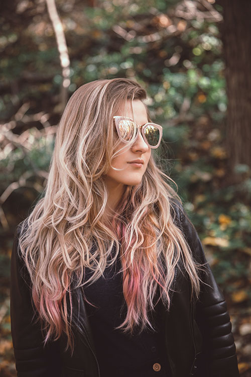 model with colored curly hair